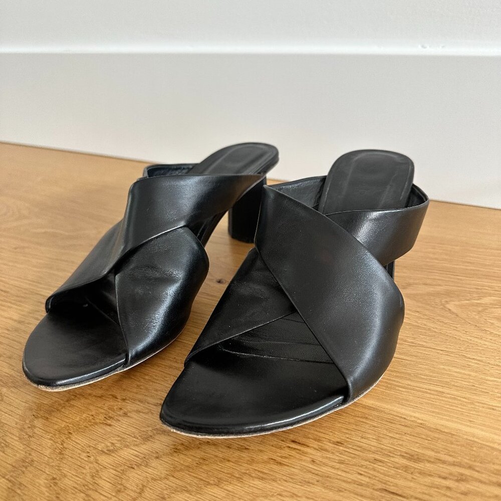 by FAR black leather sandals
